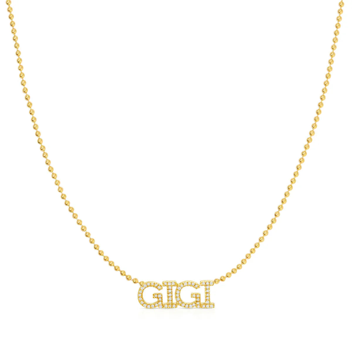 A Pavé 'GIGI' Necklace in yellow gold on a bead chain on a white background.