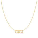 A Pavé 'GIGI' Necklace in yellow gold on a cable chain on a white background.