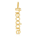 A yellow gold Petite Nameplate Pendant with 'theodore' on a white background. 