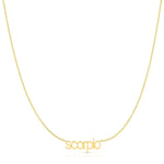 Petite Zodiac Necklace ‘scorpio’ in yellow gold on a white background.