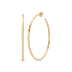 A Sleek & Chic Hoops - Medium in yellow gold on a white background. 
