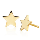 A pair of 14K Gold Charm Studs- Star in yellow gold on a white background.