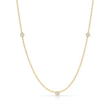Triple Diamond Layering Necklace in yellow gold on a white background. 