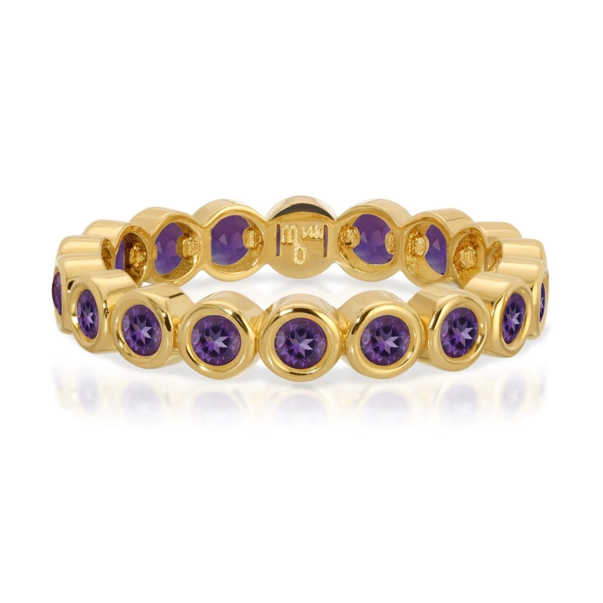 The Violet Bouquet Ring in yellow gold on a white background. 