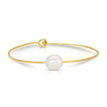 A Baroque White Pearl Bangle on a white background. 