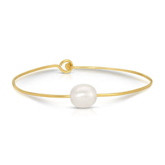 A Baroque White Pearl Bangle on a white background. 