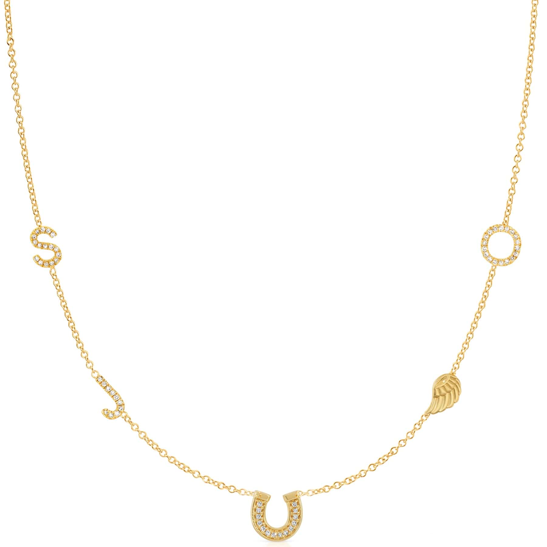 Gold necklace with horseshoe and circular pendant on a white background