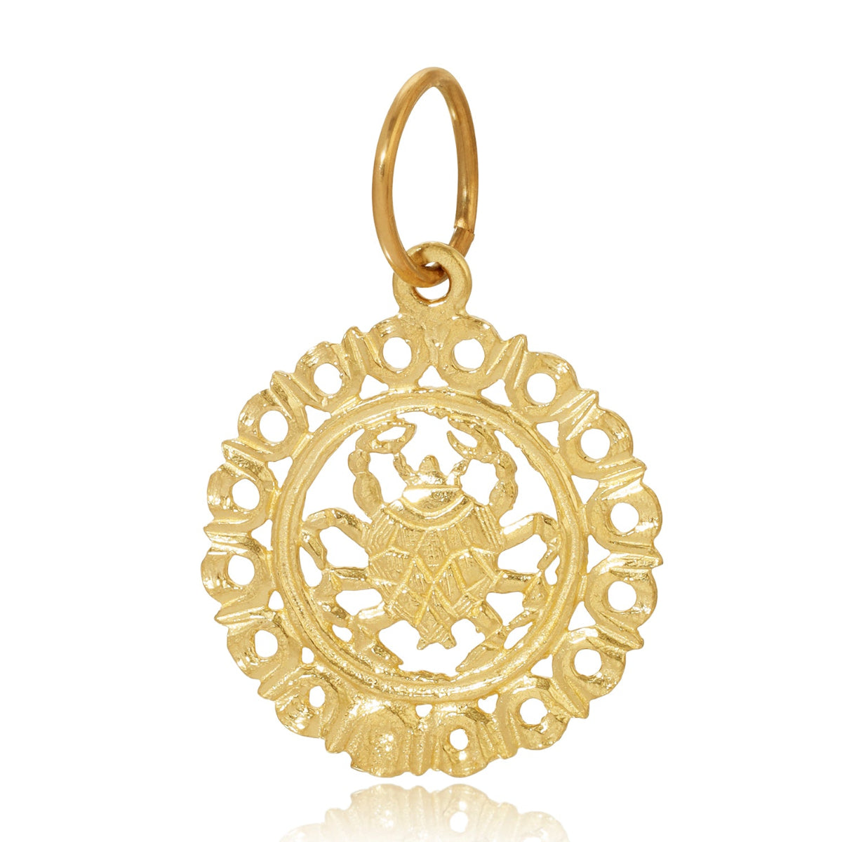 gold cancer pendant on white background