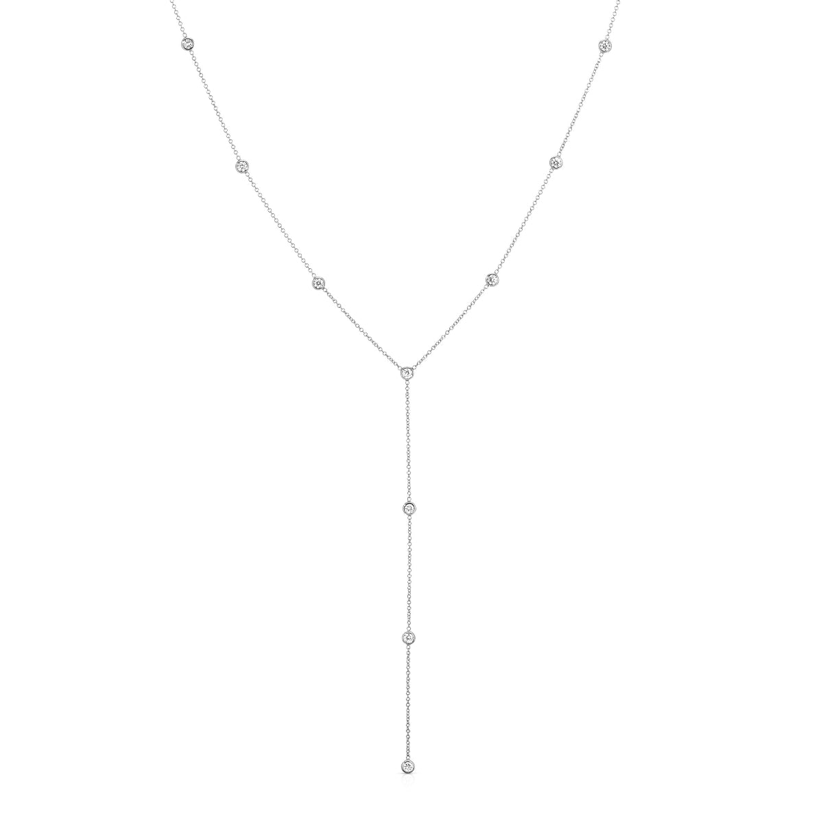 A white gold Y-shaped lariat necklace with multiple small diamonds along the chain, displayed against a white background.