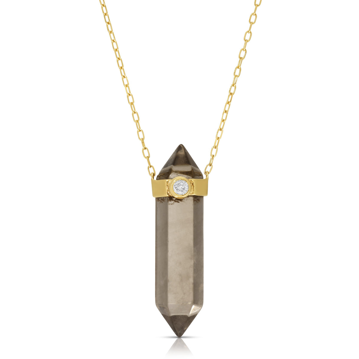 A necklace featuring a hand-cut smoky quartz crystal point with a 14k gold band and a 2.5 mm diamond, attached to a 20-inch diamond-cut chain.