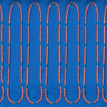 Several Endless Summer Necklaces - Calypso laid against a blue fabric background.