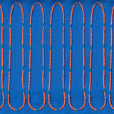 Several Endless Summer Necklaces - Calypso laid against a blue fabric background.