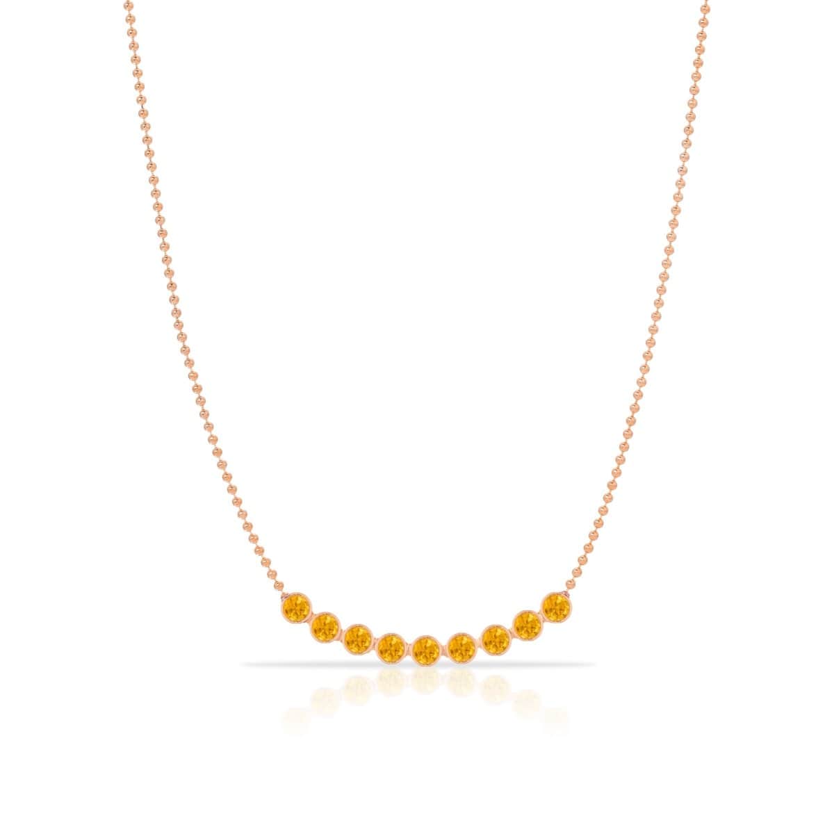 A Birthstone Arc Layering Necklace – Rose Gold in Citrine – November on a white background.