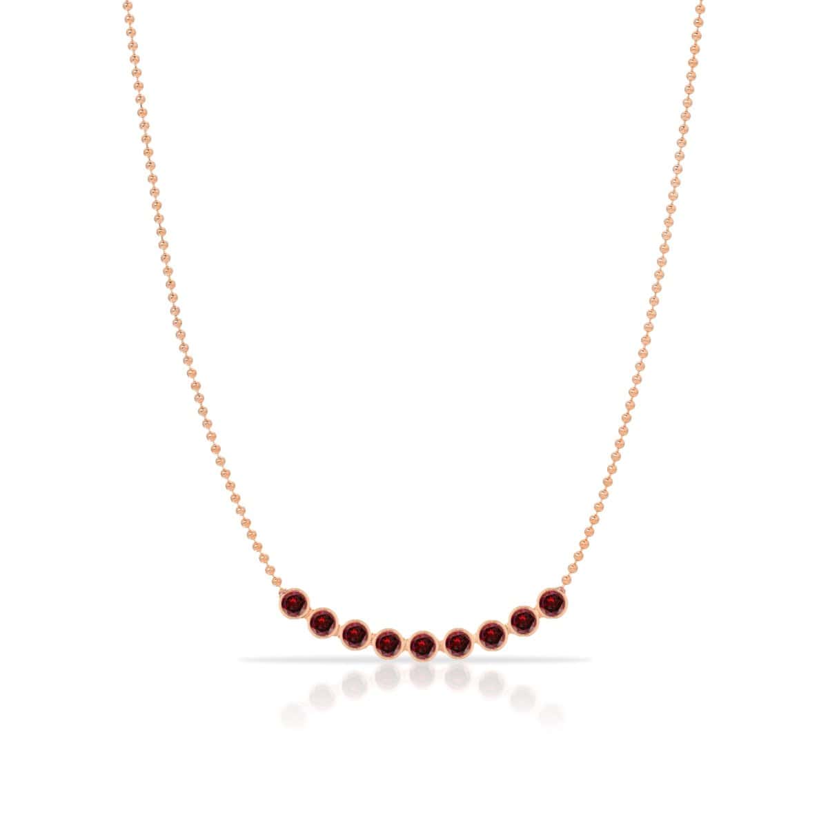 A Birthstone Arc Layering Necklace – Rose Gold in Garnet – January on a white background.