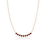 A Birthstone Arc Layering Necklace – Rose Gold in Garnet – January on a white background.