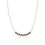 A Birthstone Arc Layering Necklace – Rose Gold in Onyx – August on a white background.