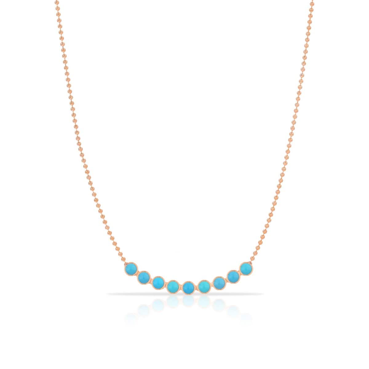A Birthstone Arc Layering Necklace – Rose Gold in Turquoise – December on a white background.