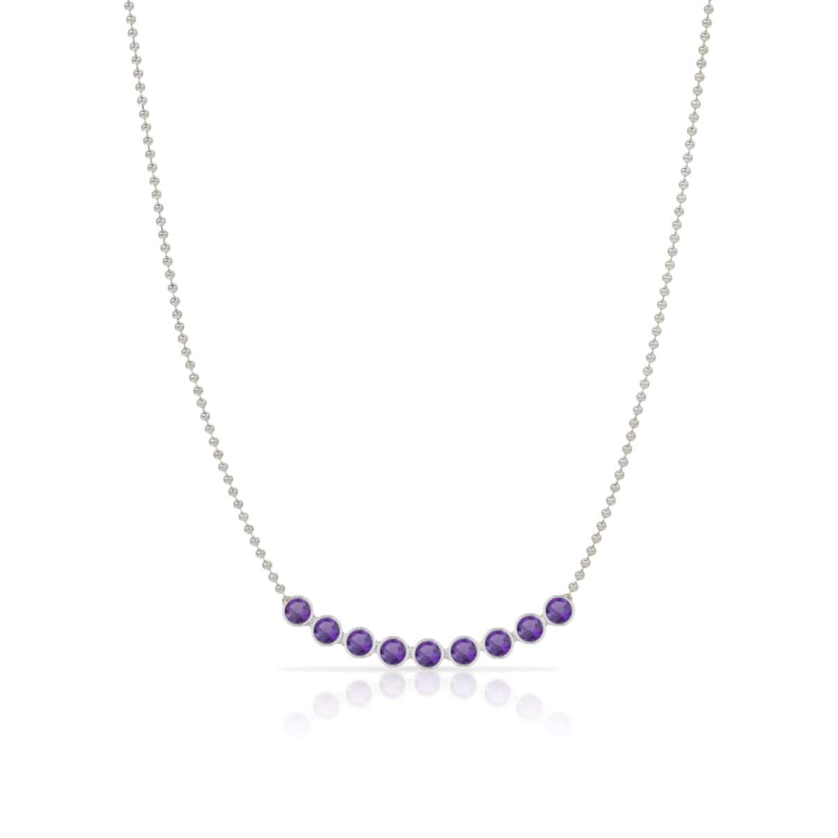 A Birthstone Arc Layering Necklace – White Gold in Amethyst – February on a white background.