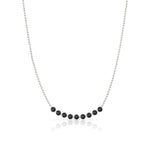 A Birthstone Arc Layering Necklace – White Gold in Onyx – August on a white background.