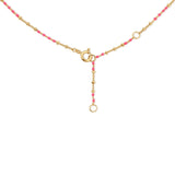 The back of a Confetti Necklace - Pink on a white background. 