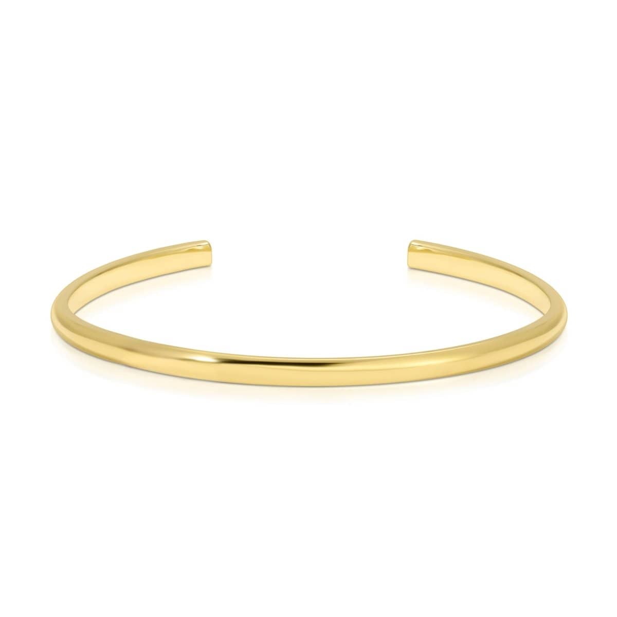 A gold vermeil Rendezvous Cuff on a white background. 