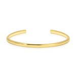 A gold vermeil Rendezvous Cuff on a white background. 