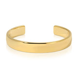 A gold vermeil All in Cuff on a white background. 