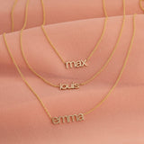 small lowercase nameplate necklaces in gold 'max louis emma'