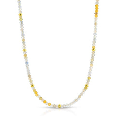 An Endless Summer Necklace - Saint-Tropez on a white background. 