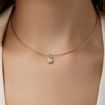 Close-up of a neck wearing an Omega Chain with a Queen Diamond Pendant. 