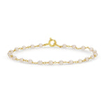 The Lily Bouquet Bracelet on a white background. 