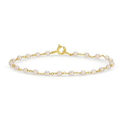 The Lily Bouquet Bracelet on a white background. 