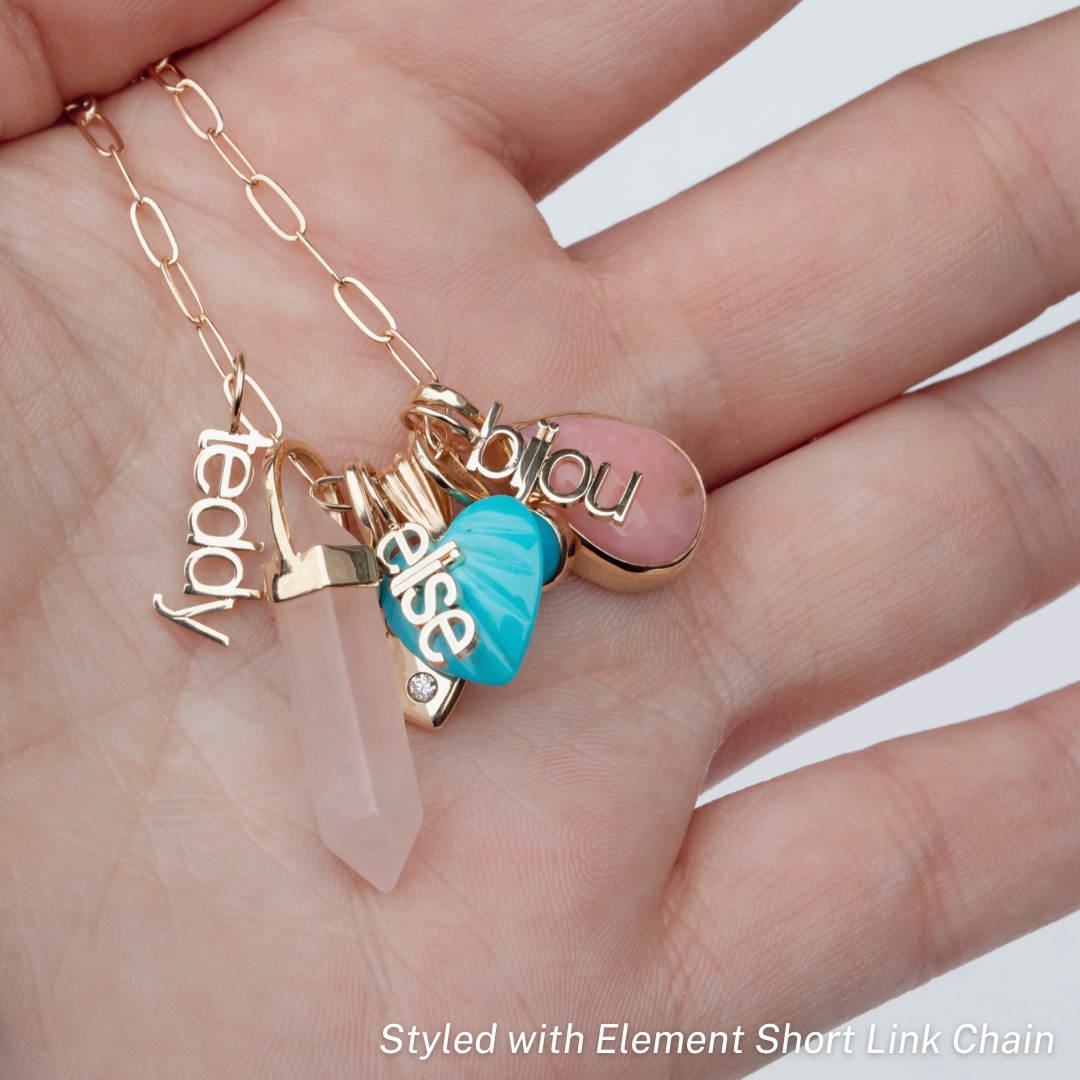 crystal nameplate charms necklace with turquoise heart, pink opal charm, and pink rose quartz crystal pendant