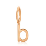 Rose gold letter 'b' charm on a white background