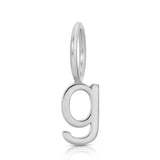 white gold letter 'g' pendant on a white background