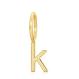 Gold letter 'K' pendant on a white background