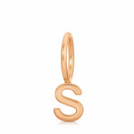 Rose gold letter 'S' pendant on a white background
