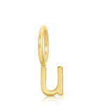 Gold letter 'u' charm on a white background
