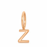 Rose gold letter 'Z' pendant on a white background