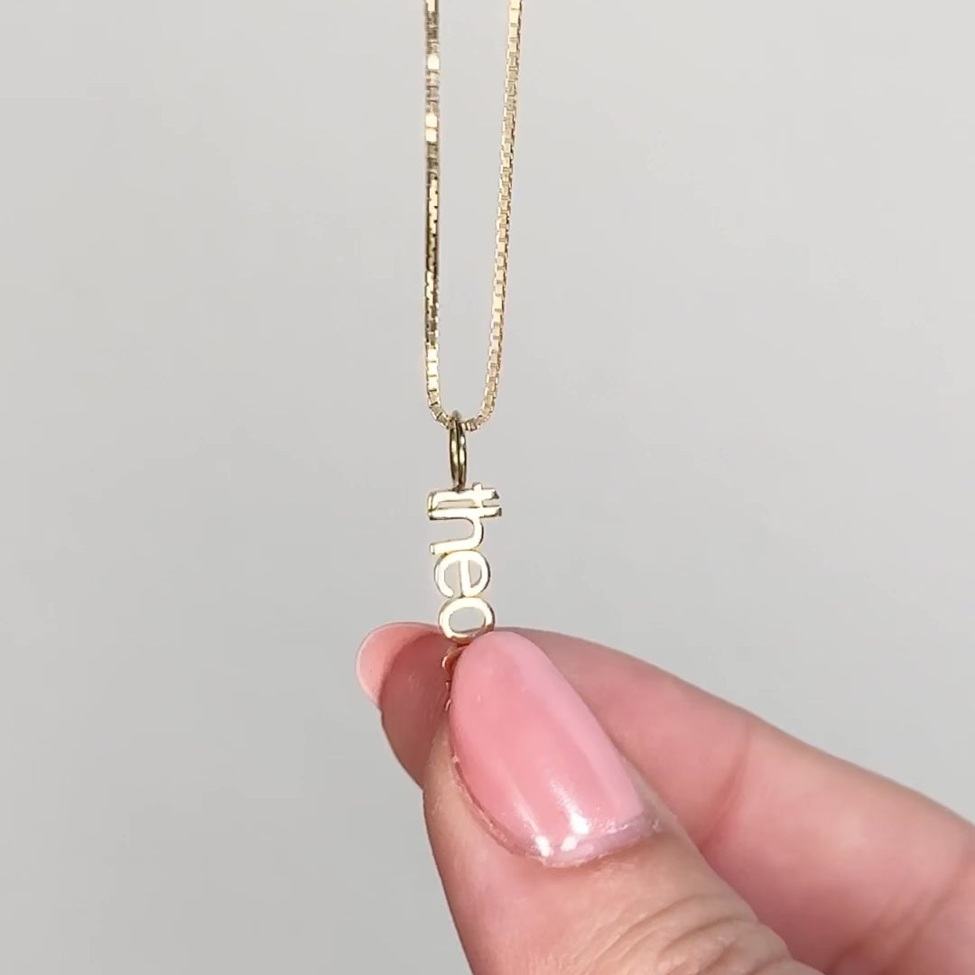 small letter vertical nameplate pendants on chain in gold