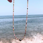 An Endless Summer Necklace - Sweet Escape with the ocean as the background. 