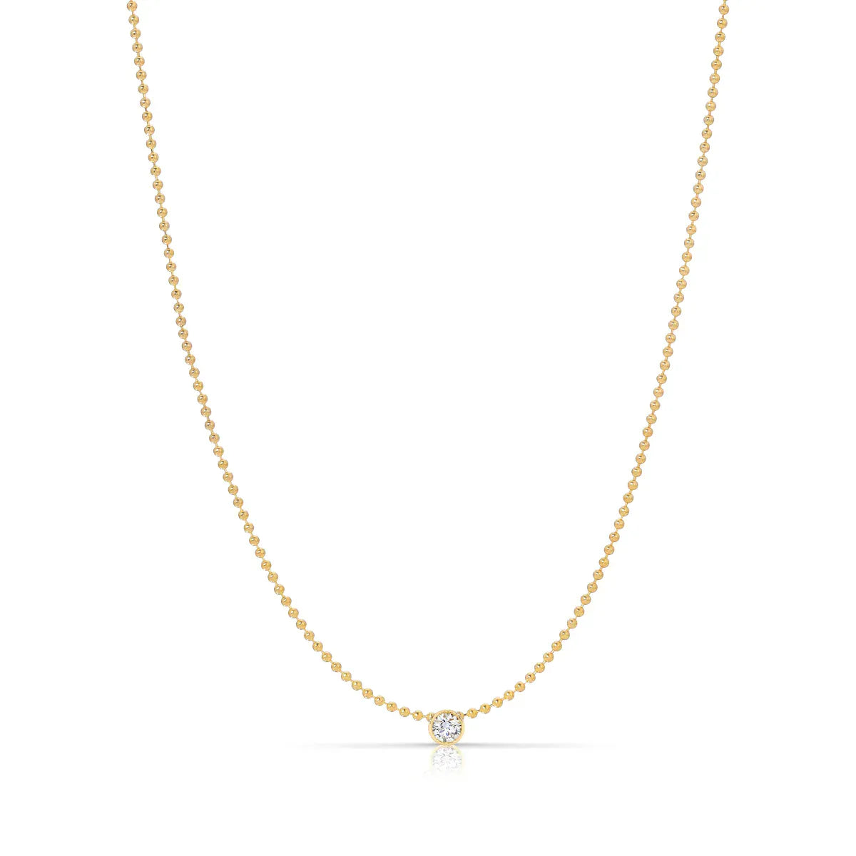 A Single Birthstone Layering Necklace - Yellow Gold in Diamond - April on a white background.