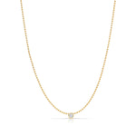 A Single Birthstone Layering Necklace - Yellow Gold in Diamond - April on a white background.