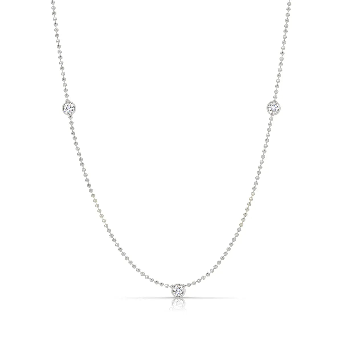 A Triple Birthstone Layering Necklace - White Gold in Diamond - April on a white background. 