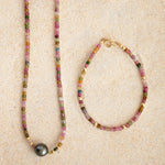 An Endless Summer Necklace - Sweet Escape and an Endless Summer Bracelet - Coral Reef on a sand background. 