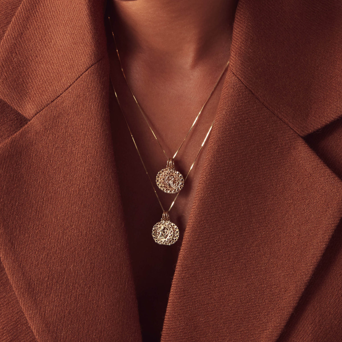 zodia pendants word with brown blazer