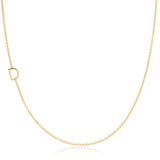 A gold necklace with a D letter charm on a white background. 