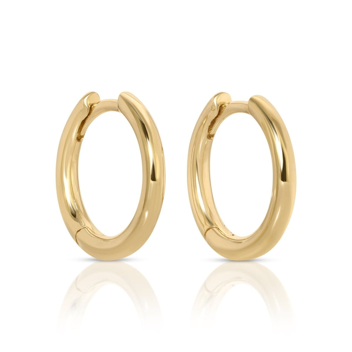 A pair of Thin Gold Hoops on a white background. 