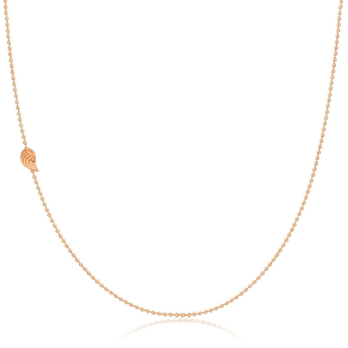 A rose gold 14k Gold Asymmetrical Charm Necklace - Angel Wing with a bead chain on a white background. 
