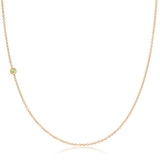 A rose gold 14K Gold Asymmetrical Birthstone Necklace - Peridot (August) on a white background. 